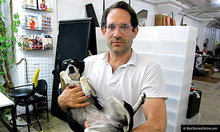 Dov Charney with frightened dog.