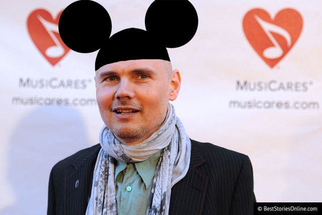 Corgan pictured wearing mouse ears at a charity event.